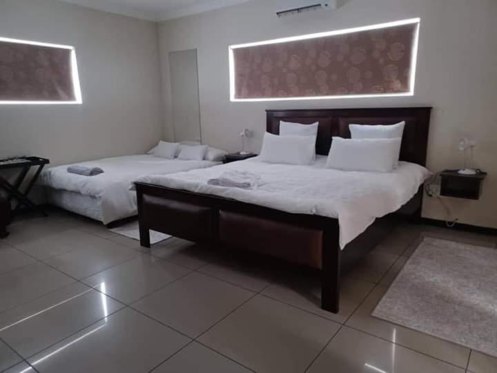Carlo'S Boutique Guesthouse Γουάλβις Μπέι Δωμάτιο φωτογραφία